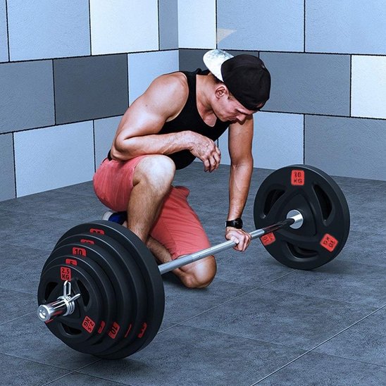 cinq-sortes-de-poids-montes-sur-barre-de-musculation