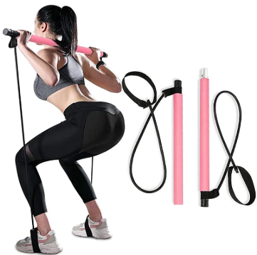 femme-qui-utilise-la-barre-musculation-pilate-rose